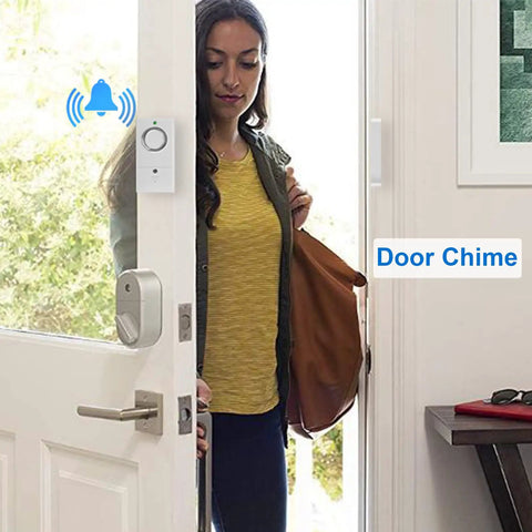Woman entering through door with Home Window And Door Alarm With Chime Two Modes Chime And Alarm Easy Install 8 Pack installed.