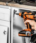 Battle Ready Heavy Duty Cordless Drill Driver Featuring Four Speed Rugged Metal Gearbox Brushless Motor Maximum Torque Output For Wood Metal Plastic Projects in use for fastening.
