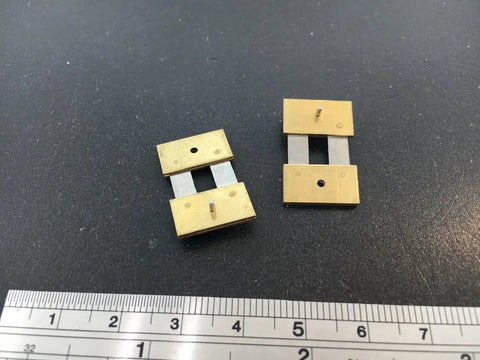 Replacement Part For Brass Clock Suspension Spring Set Of 2 DIY Clock Assembly Kit on black surface with ruler