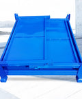 Built Like A Tank Heavy Duty Steel Storage Cage With Collapsible Stackable Design For Warehouse And Workshop Parts Handling viewed from the front.