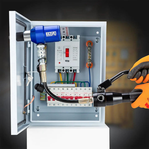 Electrician using 360 Degree Rotating Hydraulic Knockout Punch Kit Half Inch To 2 Inch Electrical Conduit Hole Cutter Set