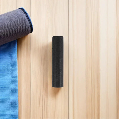 Ergonomic Lifting Handle Covers For Dumbbells And Barbells Non Slip Plastic Grips on wooden floor with fitness mat