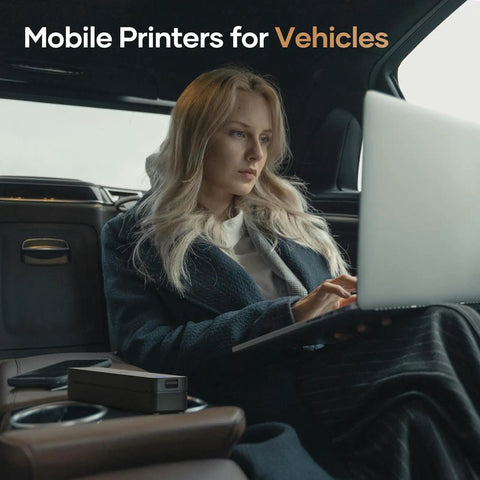 Game Changing Portable Bluetooth Printer With No Hassle Inkless Thermal Tech for use in vehicles with a woman working on a laptop.