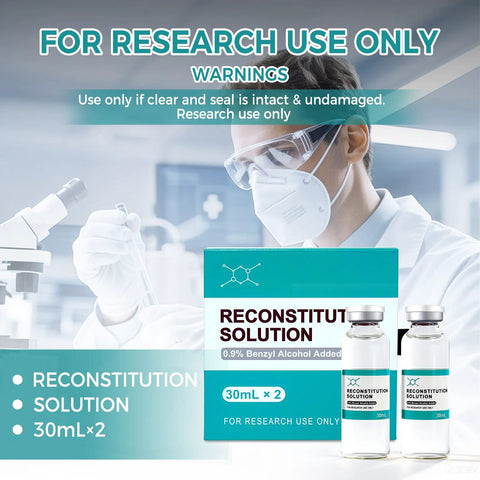 Front view: two 30mL glass vials labeled Reconstitution Solution beside teal box.