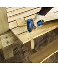 Using the Lightweight 12V Max Brushless Impact Driver Bare Tool with Ultra Compact 5.4 Inch Head for woodwork on deck