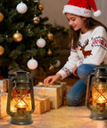 Girl decorating by tree with Vintage LED Outdoor Lantern With Dancing Flame Wick, Battery Powered Waterproof Camping Lamp