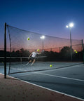 Tennis court with net, similar in design to 10x10 Ft Golf Practice Fence Net, 400GSM Heavy Duty Barrier Net for backyard use.
