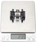 Beefed Up Brass Skid Plate For Redcat Ascent 18 RC Crawler on scale weighing 23.9 grams, durable brass construction