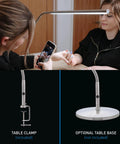 Woman using Slimline LED Table Lamp With 80 CRI Eye Care, flexible neck, 4 step dimmer, clamp base in brushed steel, manicure setting
