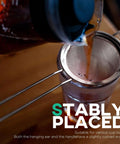 3.3 Inch Fine Mesh Strainer 304 Stainless Steel Cocktail Sieve filtering coffee into a cup