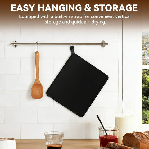 Ultimate Espresso Machine Slider Compatible With Breville 870XL black mat hanging on kitchen wall next to wooden spoon.