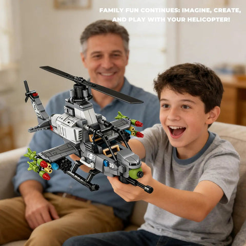 Boy holding Cobra Attack Helicopter Building Block Set, 512 Plus Pieces, Compatible With Lego Plane Sets, smiling with adult in background.