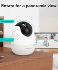 Indoor Smart AI Detection Security Camera For Pets Babies And Home Nanny Cam Vibe 1080P FHD on desk with phone screen display