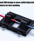Compact Wire Soldering Clamp Holds Cables Tight For Precise Welding Jobs, featuring black plastic dual SIM design for stability.
