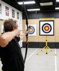 Backyard Archery Target Kit With High Density EVA Foam For Practice Arrow Stopping Cushion in use with bow indoors