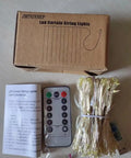 Box displaying LED curtain lights with remote, USB connector, and manual; Multicolor USB Curtain Lights With Eight Modes For Indoor And Outdoor Decor.