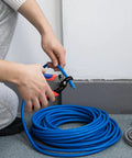 Person using 2 In 1 Wire Stripper And Cable Cutter for Multi Core Round And Coaxial Wires with 65Mn steel, rust-resistant finish.