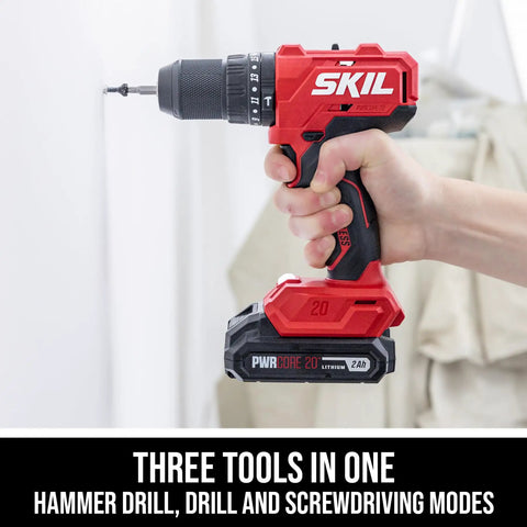 Tough As Nails 20V Brushless Cordless Hammer Drill Kit with quick charge battery, being held and used for drilling.