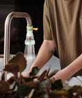 Person using 360 Rotating Faucet Filter Extenders Set For Sink Direct Water Flow And Splash Reduction on kitchen tap