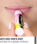 Applying Pink Lemonade lip balm for moisturizing lip care, part of Sweet Watermelon Lip Balm Trio, 0.15 oz each, three pack.