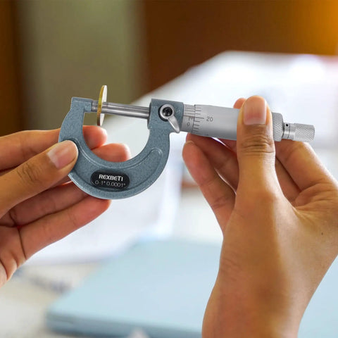 Outside Micrometer With Carbide Tip, Pro Grade Precision 0-1 Inch Range, 0.0001 Inch Accuracy, Vernier Scale For Exact Diameter Readings, Ratchet Stop For Consistent Testing Pressure, Durable Baked Enamel Frame Protection, held by hands