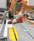 Dead Legit Sliding Table Saw Clamp And Presser featuring rugged cast iron, securing wood for precise cuts on a table saw.