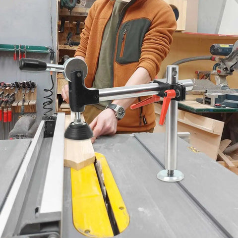 Dead Legit Sliding Table Saw Clamp And Presser featuring rugged cast iron, securing wood for precise cuts on a table saw.