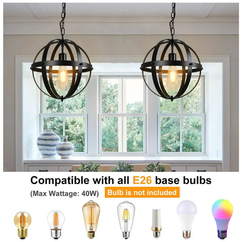 Two globe design pendant lights with E26 base compatibility hanging in a bright room