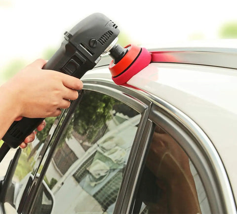 Close-up of 29 Piece Drill Buffing Pad Kit With 5/8-11 Backing Pad Threads for car polishing on white vehicle roof