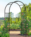 Sturdy Metal Garden Arch For Outdoor Entry And Wedding Backdrop Seven Point Two Foot Arbor surrounded by climbing plants outdoors.