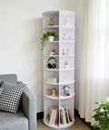 360 Degree Rotatable White Corner Shoe Rack And Bookshelf, 7 Tier Dope Space Saver Shoe Tower in a living room corner