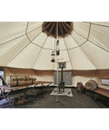 Interior view of Base Camp Tent For All Weather Adventures With Stove Jack Four Season Camping For Hiking And Hunting.