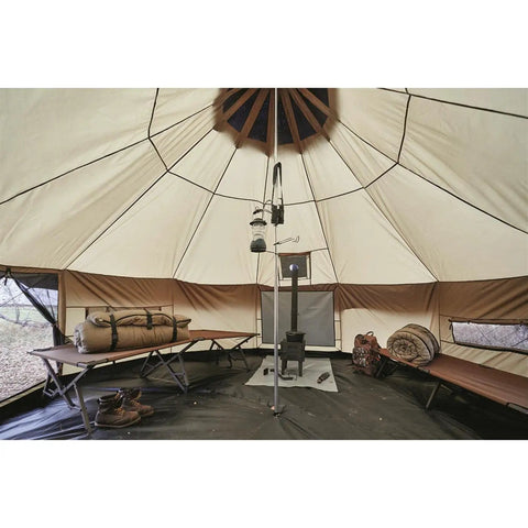 Interior view of Base Camp Tent For All Weather Adventures With Stove Jack Four Season Camping For Hiking And Hunting.