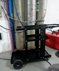 MIG Welder Cart With Table Top Cabinet And Gas Bottle Storage in workshop, featuring durable construction and 400 lb capacity.