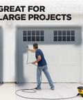 No Fuss Heavy Duty Airless Paint And Stain Sprayer used on a garage door with a 25 ft hose for quick coverage.