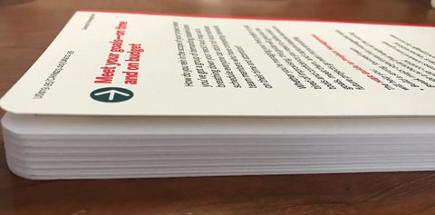 Project Management Playbook That Helps You Nail Scope And Win Over Stakeholders Map Realistic Schedules Stay On Time And On Budget Motivate Your Team And Deliver Real Results paperback book cover on wood table