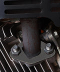 Close-up of Predator 212 Exhaust Muffler Gasket Kit for 212cc Non Hemi Carb Exhaust Pipe with mounting bolts and studs