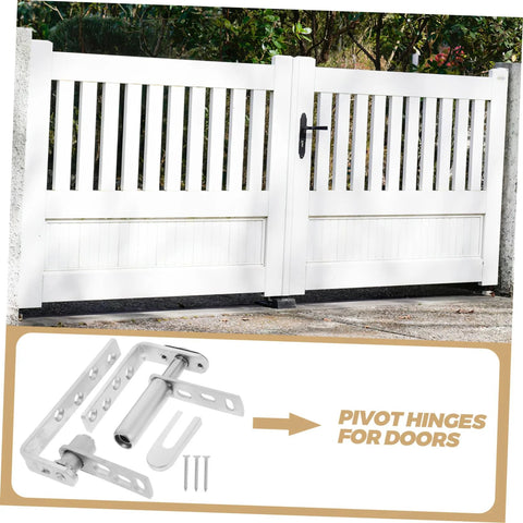 White wooden gate with close-up of stainless steel pivot hinges for doors in a garden setting.