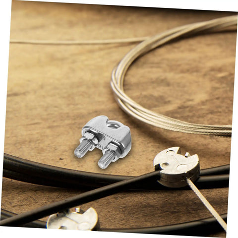 Heavy Duty Stainless Steel Wire Rope Cable Clamp U Bolt Fastener For 6mm Line with bolts on wooden background.