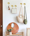 Ginkgo Leaf Wall Hooks Four Piece Iron Gold Key Holder And Hat Hanger mounted on wall organizing bags and accessories