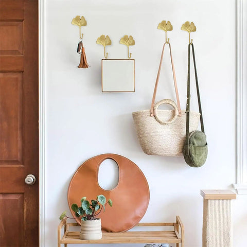 Ginkgo Leaf Wall Hooks Four Piece Iron Gold Key Holder And Hat Hanger mounted on wall organizing bags and accessories