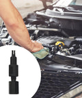 Blind Hole Bearing Puller Removal Tool with Steel Collet for internal bearing removal in auto repair; tool beside open car engine.