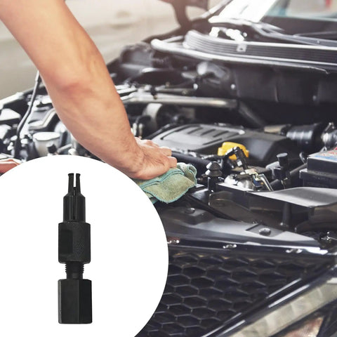 Blind Hole Bearing Puller Removal Tool with Steel Collet for internal bearing removal in auto repair; tool beside open car engine.