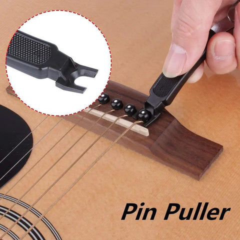 Upgrade Your Guitar Game With This Pro 3-In-1 String Winder Tool, featuring a compact pin puller on an acoustic guitar.