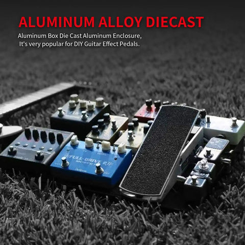 Aluminum alloy diecast pedal enclosures on grass, popular for DIY guitar effects, showcasing durable build and versatile design.