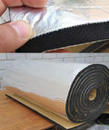 Badass Self Adhesive Aluminum Foil Insulation Roll With Heavy Duty Thermal Soundproof Foam 30mm thickness held up with a roll visible.