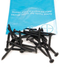Tough As Nails Six X Two Inch Drywall Screws Featuring Slick Black Phosphate Coating And Flawless Bugle Heads For Metal Studs Anchoring And Drywall Patching Fifty Pack Phillips Fasteners stacked around packaging.