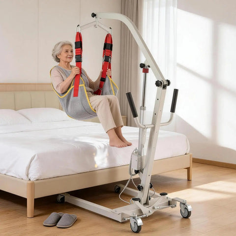Heavy Duty Electric Patient Transfer Lift With Sling 510 Lbs Capacity assisting an elderly woman above a bed.