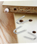 50 Pack U Shaped Fence Staples For Quick Install And Strong Hold Durable Metal Garden Stakes For Fences Landscaping And DIY Projects Multi Function Iron Pegs shown with wooden board