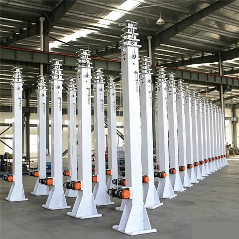 Electric Motorized Telescopic Mast 6.5M Aluminum Broadcast Antenna Pole lined up in factory warehouse with motorized bases.